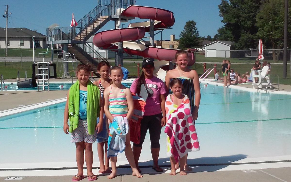 Image of 6 kids after pool lessons